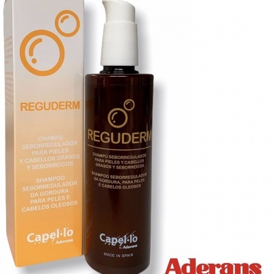 Frasco de champô REGUDERM da Capel·lo com caixa branca e laranja
