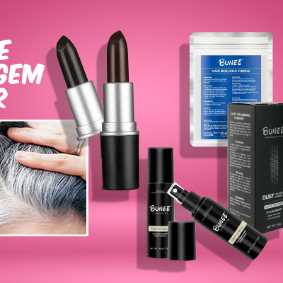 Produtos Bunee para maquilhagem capilar com embalagens pretas e brancas sobre fundo rosa