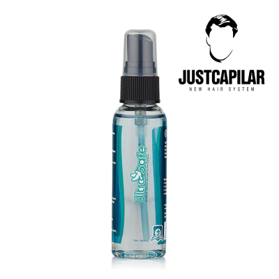 Frasco de spray UltraSafe azul com tampa preta e logótipo JUSTCAPILAR