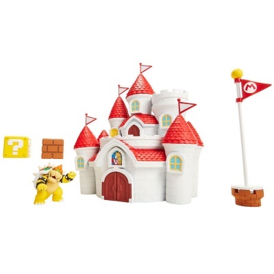 Brinquedo castelo branco com telhados vermelhos, Bowser amarelo, bloco amarelo com interrogação, bandeira vermelha M