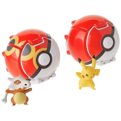 Dois brinquedos de Pokébola vermelha e branca com figuras de Pokémon cinza e amarelo