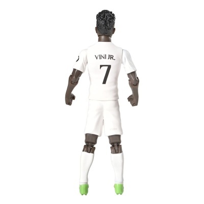 Figura de ação de jogador de futebol com uniforme branco e chuteiras verdes