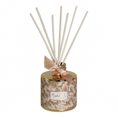 Difusor de fragrâncias com tampa dourada e padrão de penas