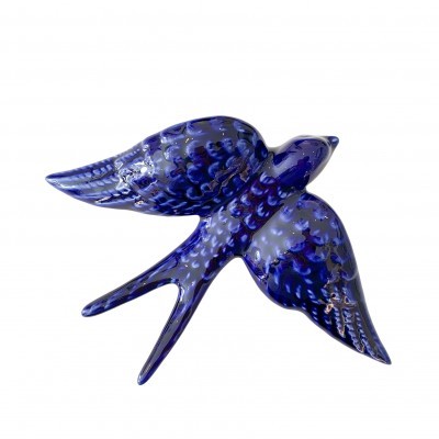 Escultura azul de pássaro em cerâmica vidrada