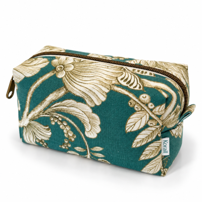 Estojo tecido verde-azulado com padrão floral e fecho zip