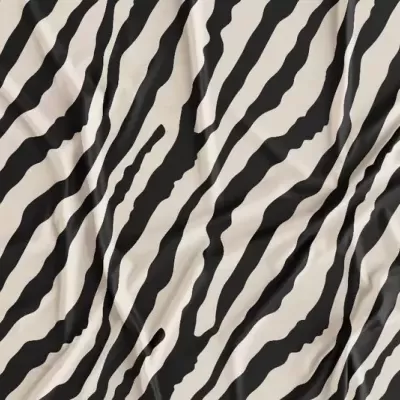 Tecido com padrão de riscas pretas e brancas.