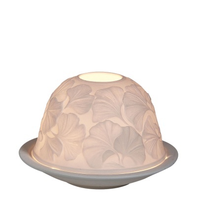 Vela aromática branca com padrão floral em recipiente cinzento e azul