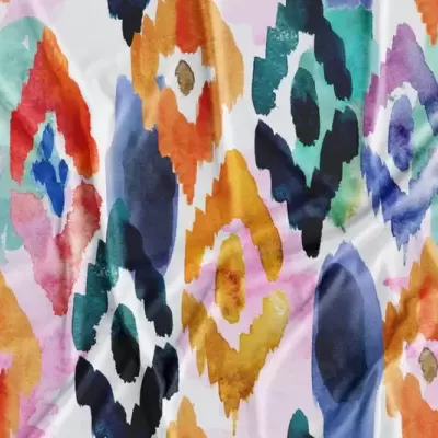 Tecido colorido com padrão geométrico e aquarela