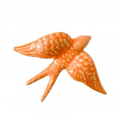 Escultura de pássaro em cerâmica laranja brilhante