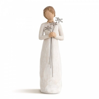 Figura decorativa de mulher com vestido branco e flores metálicas