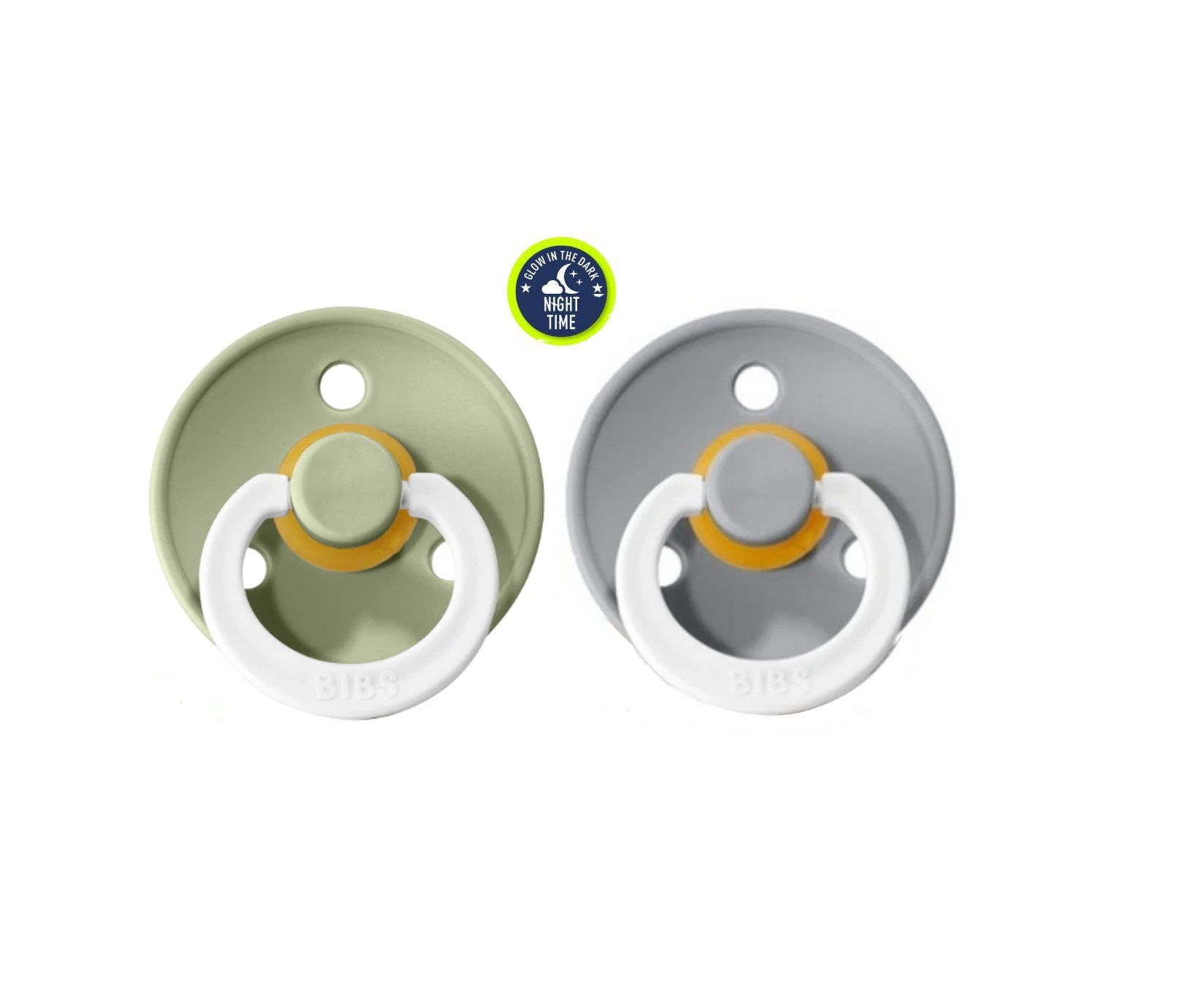 CHUPETA NOCTURNA SAGE/CLOUD Dois chupetas em silicone verde e cinzento com argolas brancas e detalhes amarelos