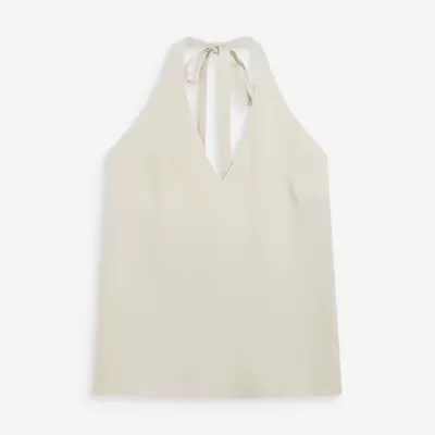 Top halter creme com decote em V e tiras para amarrar no pescoço