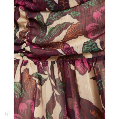 tecido floral enrugado com cores verdes, roxas, vinho e bege