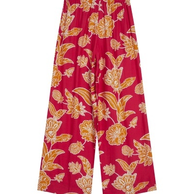 Calças largas vermelhas com padrão floral amarelo e branco