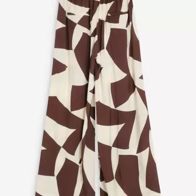 Calças largas com padrão castanho e creme