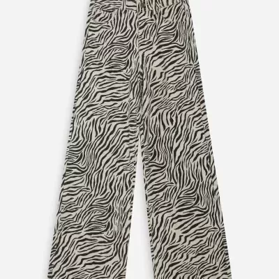 Calças compridas zebrado preto e bege com bolsos e botão