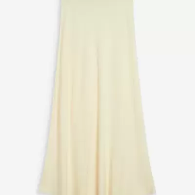 Saia longa creme lisa com corte amplo