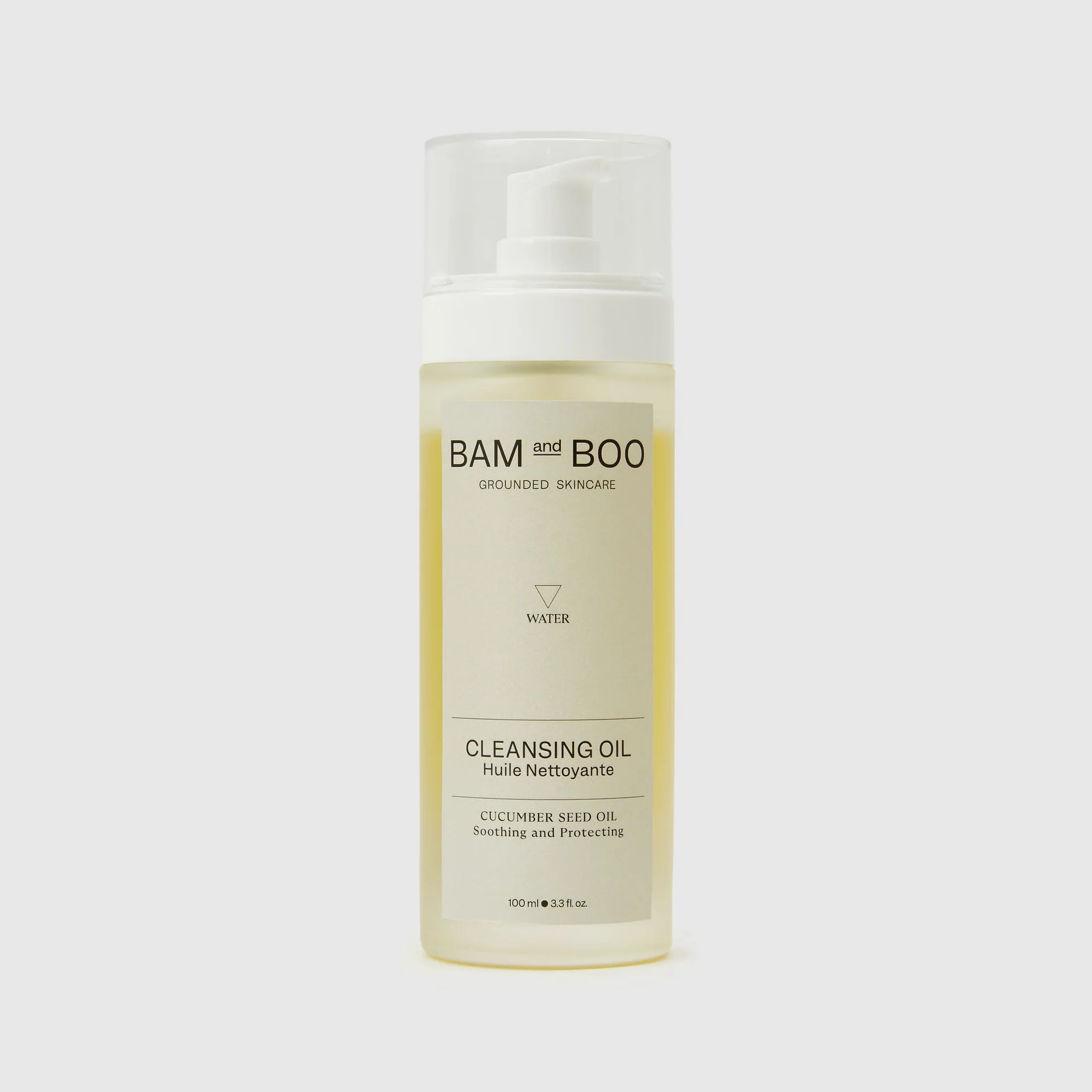 Frasco de óleo de limpeza BAM and BOO com doseador branco e líquido amarelo claro