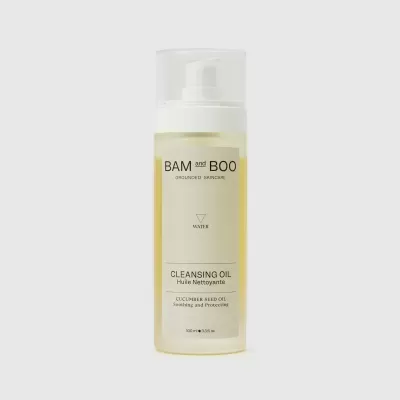 Frasco de óleo de limpeza BAM and BOO com doseador branco e líquido amarelo claro