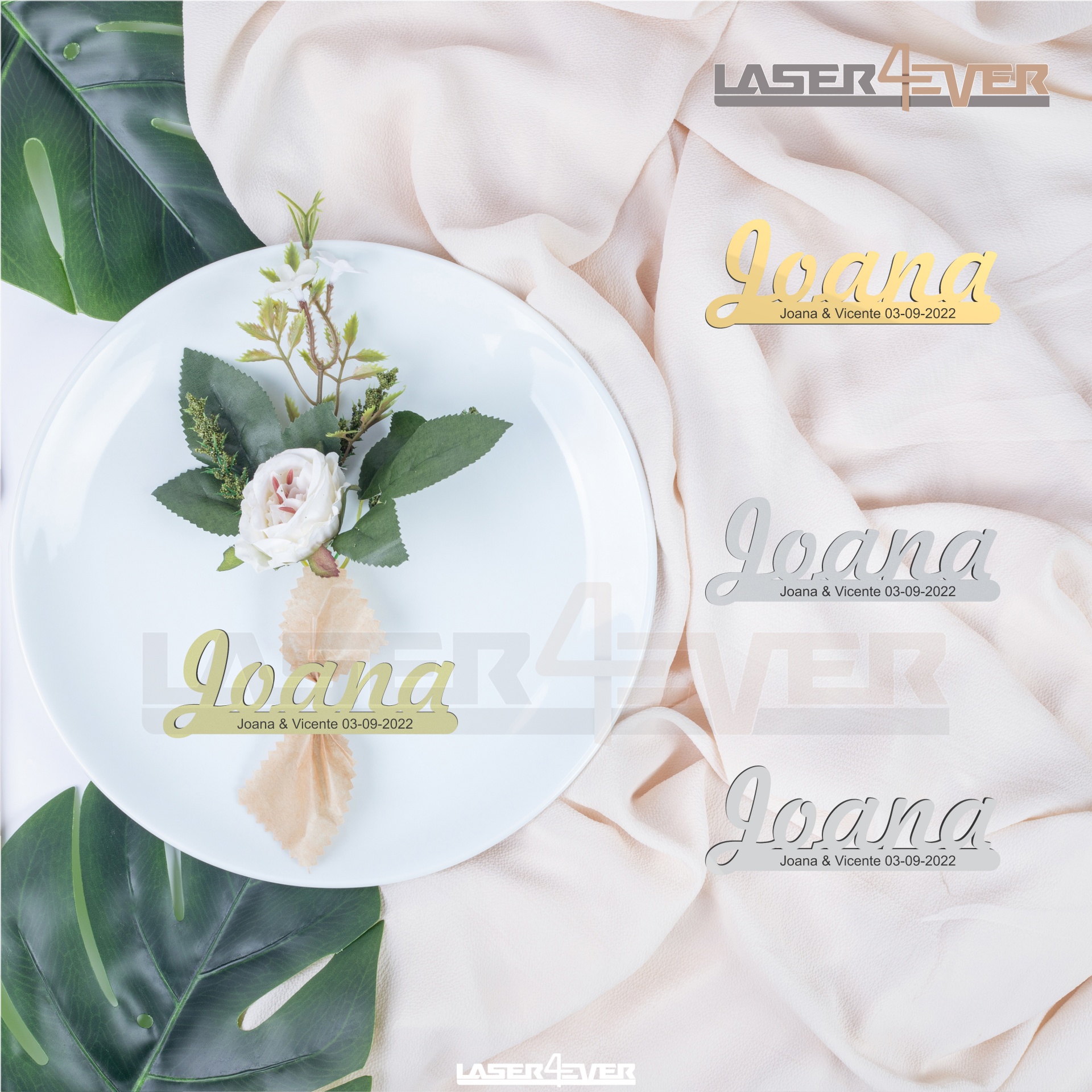 Placa decorativa com nome e data, materiais variados, em cenário com tecido bege e folhas verdes