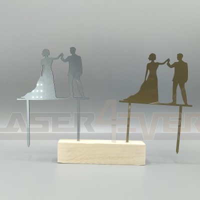 Dois cake toppers metálicos de casal a dançar, prateado e dourado, com base de madeira