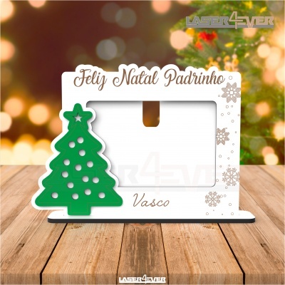 Moldura de fotografia branca com pinheiro verde e texto Feliz Natal Padrinho Vasco