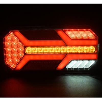 Farolim traseiro LED em vermelho, amarelo-alaranjado e branco em fundo escuro