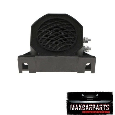 Peça automóvel preta com grelha circular e suportes laterais