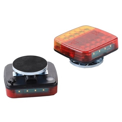 Dois dispositivos de luz quadrados com zonas vermelhas e amarelas