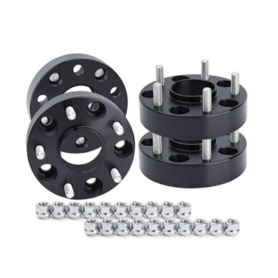 espaçadores de rodas preto com parafusos e porcas prateadas