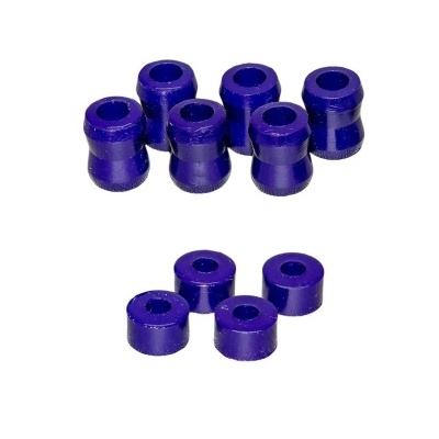 Peças plásticas ou de borracha roxas em duas formas diferentes sobre fundo branco