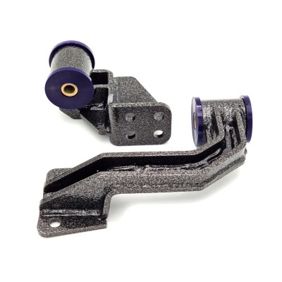 Peças metálicas cinza com inserts roxos sobre fundo branco