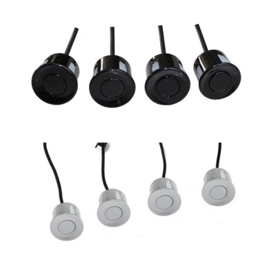 Sensores circulares pretos e cinza com cabos pretos