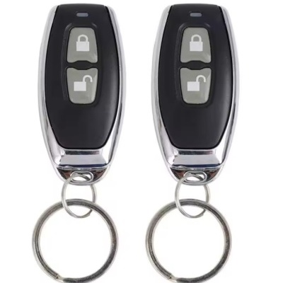 Dois comandos de porta pretos com teclas cinzentas e detalhes cromados