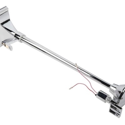 Aparelho cromado com braço longo e fios eléctricos vermelhos