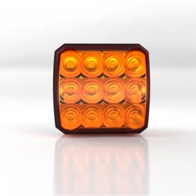 Feu de signalisation carré avec ampoules LED orange sur fond blanc.