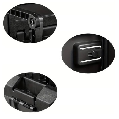 Close-up de fechos e dobradiças de mala rígida preta