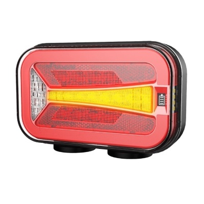 Luz traseira de bicicleta em plástico vermelho e preto com indicadores luminosos coloridos.