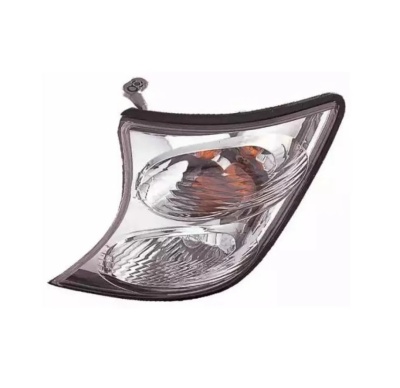 Farol de automóvel transparente com detalhes negros e âmbar