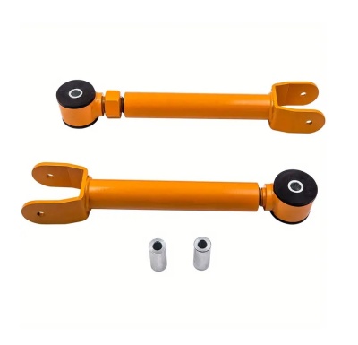 Braços de suspensão automóvel laranja com buchas pretas e espaçadores cinzentos