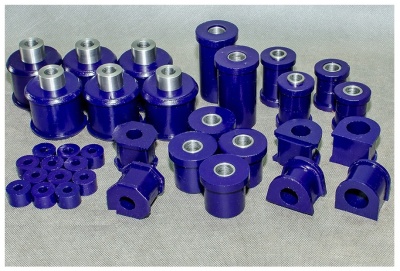 Conjunto de buchas automóveis de borracha roxa com peças metálicas internas