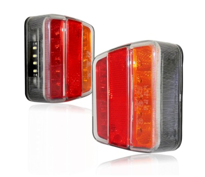 Par de farolins traseiros retangulares em plástico vermelho, laranja e transparente