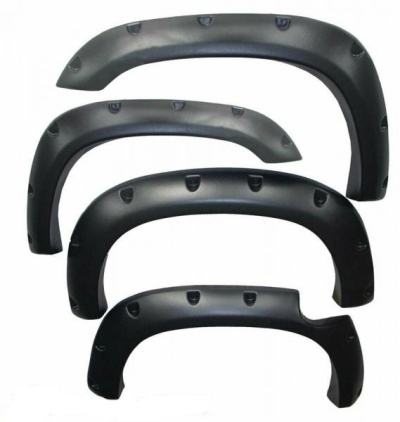 Quatro almofadas pretas de plástico com relevo