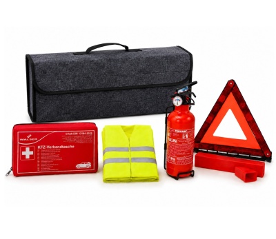 Conjunto de segurança para carro com mala cinzenta, colete amarelo, extintor, triângulo refletor e estojo vermelho.