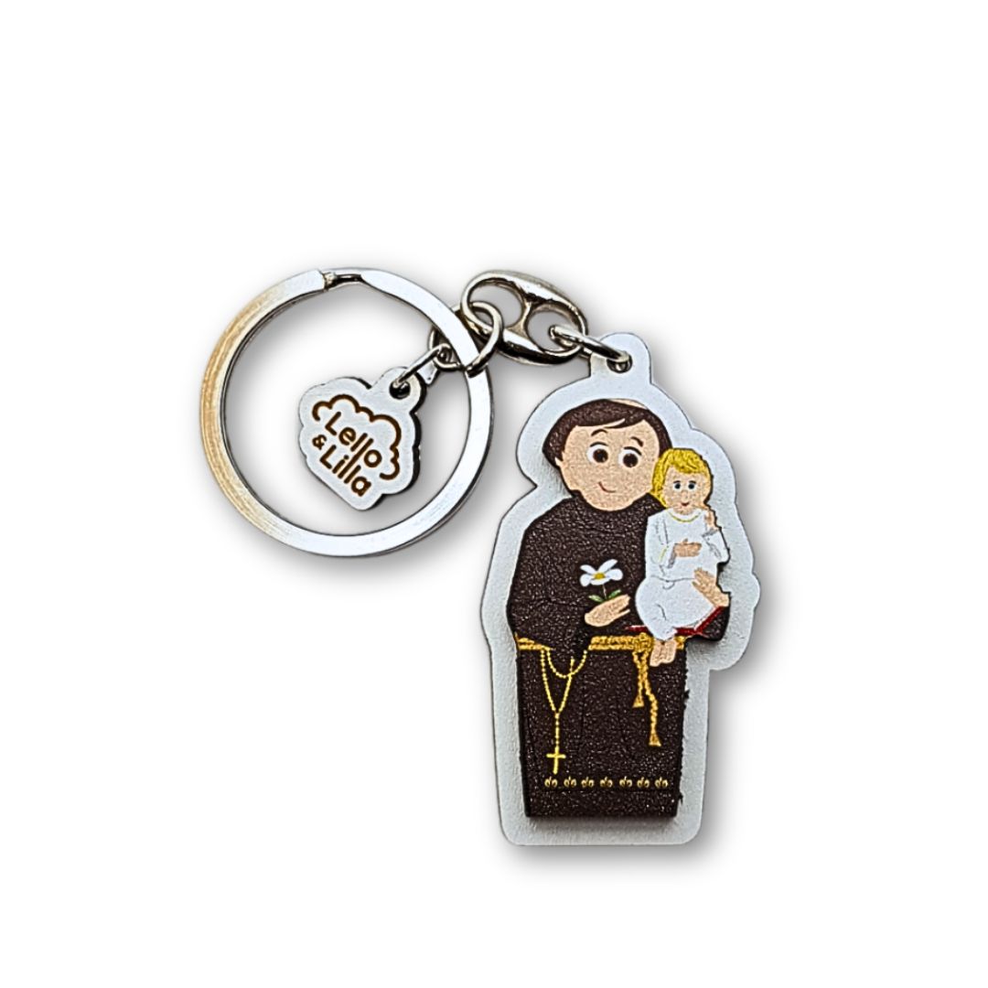 Porta-chaves com figura religiosa e pendente com texto