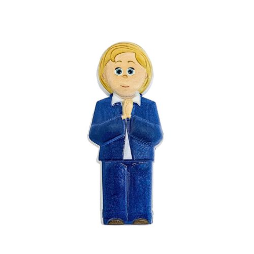 Figura de brinquedo loira com fato azul e camisa branca