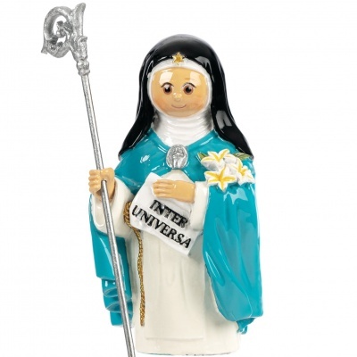 Figura decorativa de freira com hábito azul e preto, segurando um livro e um cajado.