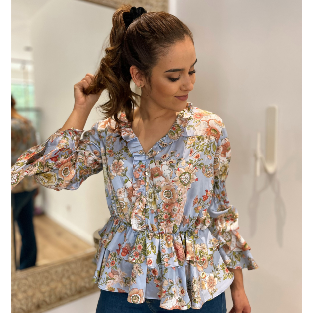 Blusa Mulher manga comprida estampada Roberta Biagi Blusa feminina azul clara com padrão floral e mangas bufantes