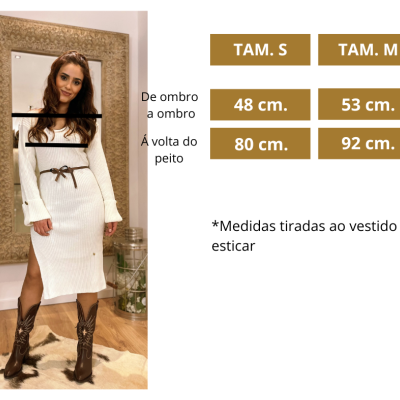 Mulher com vestido branco e botas castanhas em interior com espelho e gráfico de medidas