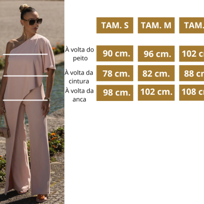 Mulher com conjunto de roupa rosa claro de uma manga e calças largas ao lado, tabela com medidas de tamanhos S, M, L.